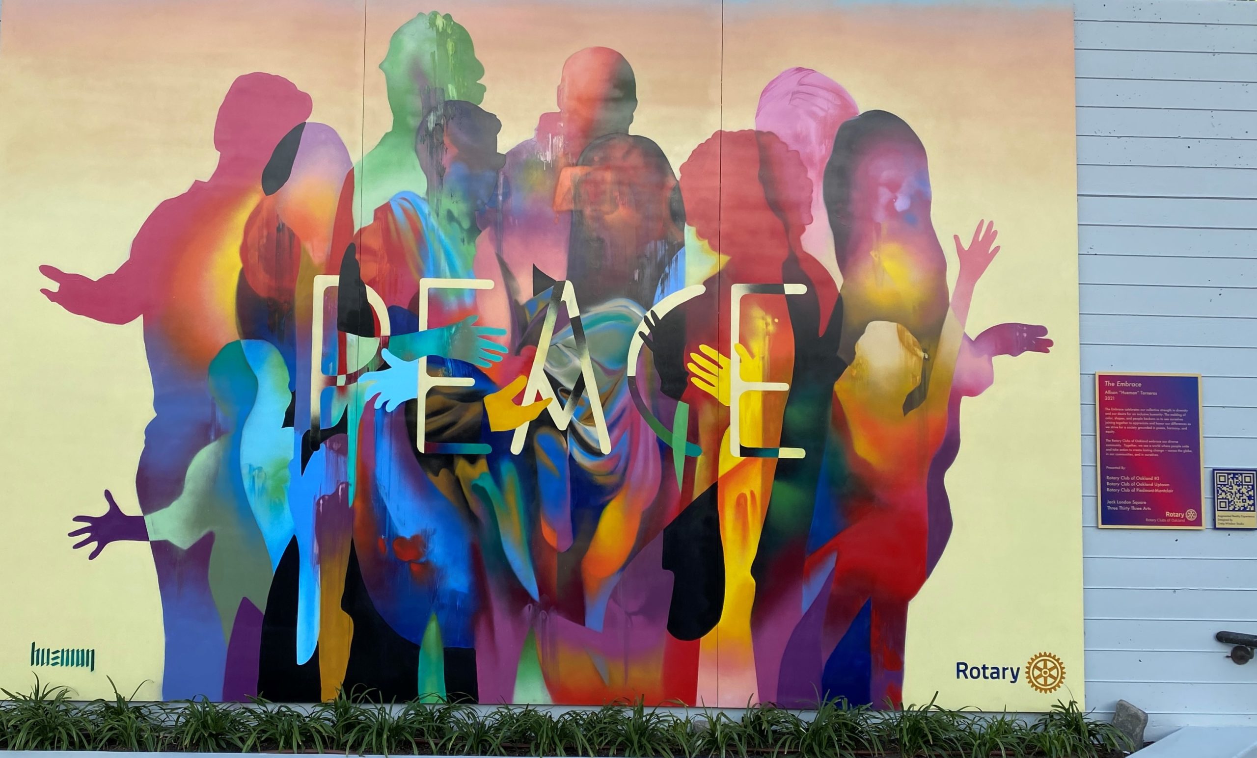 The Embrace Peace Mural by Hueman in Jack London Square